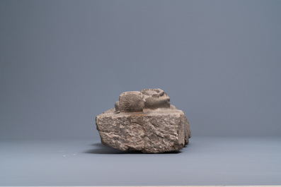 Un relief en gr&egrave;s gris sculpt&eacute; figurant une Vierge &agrave; l'enfant, dat&eacute; 1489