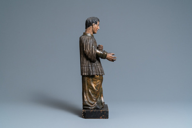 Une statue de Saint Louis de Gonzague en bois sculpt&eacute;, polychrom&eacute; et dor&eacute; aux yeux en verre, Italie, 18&egrave;me