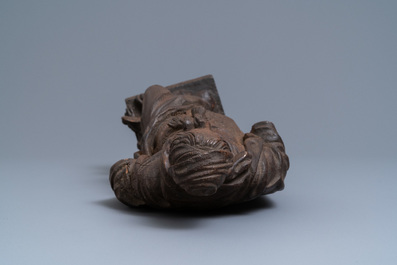 An oak figure of a female saint crushing a griffin, 2nd half 16th C.