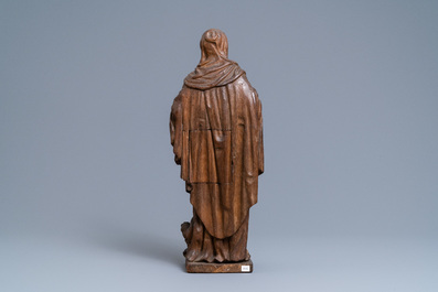 An oak figure of a female saint crushing a griffin, 2nd half 16th C.