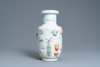 A Chinese famille rose vase with applied 'antiquities' design, Yongzheng