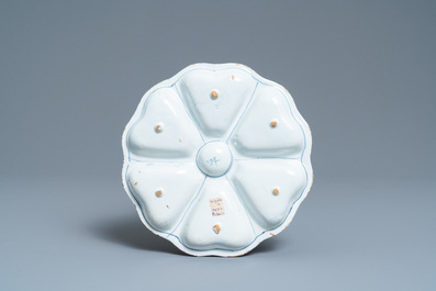 A lobed Dutch Delft blue and white spice dish with birds, late 17th C.