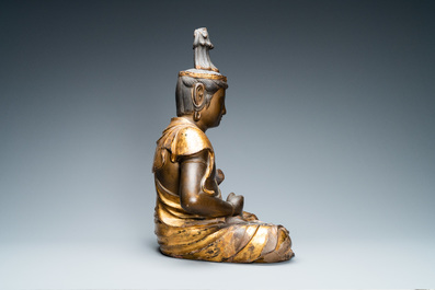 A large Japanese lacquered and gilded wooden figure of Kanon, Momoyama, 16th C.