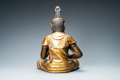 A large Japanese lacquered and gilded wooden figure of Kanon, Momoyama, 16th C.