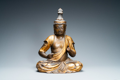 A large Japanese lacquered and gilded wooden figure of Kanon, Momoyama, 16th C.