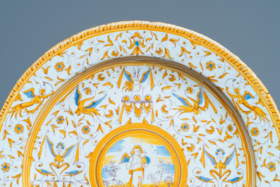 A polychrome 'grotesque' dish with a putto holding an orb, Willem Jansz. Verstraeten, Haarlem, 1645-1655