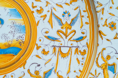 A polychrome 'grotesque' dish with a putto holding an orb, Willem Jansz. Verstraeten, Haarlem, 1645-1655