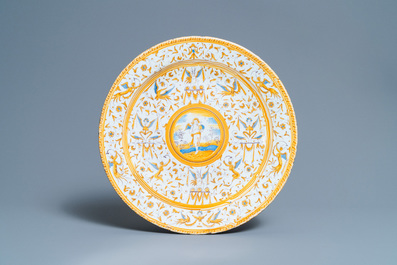 A polychrome 'grotesque' dish with a putto holding an orb, Willem Jansz. Verstraeten, Haarlem, 1645-1655