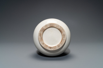 A Chinese Dehua blanc de Chine vase with applied dragon, Kangxi/Yongzheng