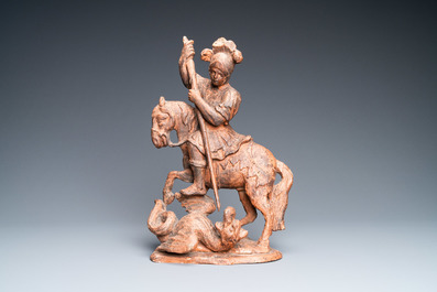 Une statue de Saint Georges en bois sculpt&eacute; monochrom&eacute; &agrave; l&rsquo;imitation de la terre cuite, 16&egrave;me
