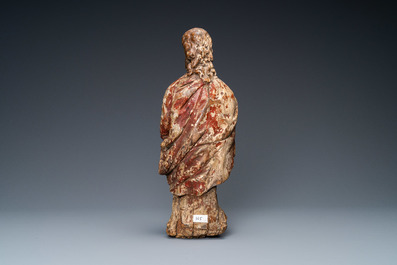 A polychromed wooden figure of an evangelist, 16th C.