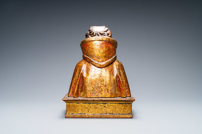 A polychromed and gilded wooden reliquary bust, Italy, 17th C.