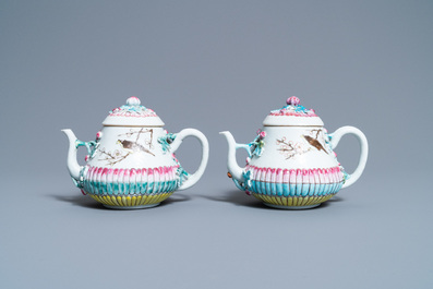 A pair of Chinese famille rose teapots and covers with applied design, Yongzheng