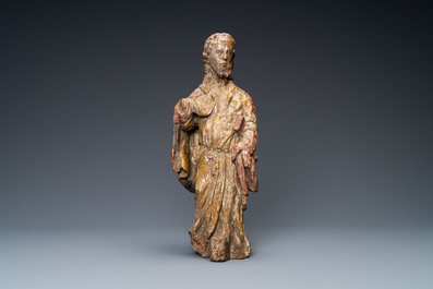A polychromed wooden figure of an evangelist, 16th C.
