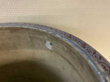 A large Chinese famille rose cylindrical vase with applied lotus scrolls, Jiaqing/Daoguang