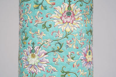 A large Chinese famille rose cylindrical vase with applied lotus scrolls, Jiaqing/Daoguang