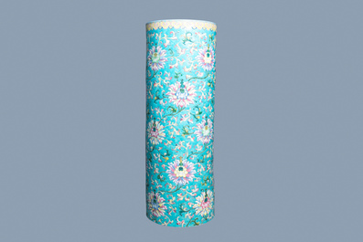 A large Chinese famille rose cylindrical vase with applied lotus scrolls, Jiaqing/Daoguang