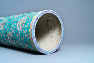 A large Chinese famille rose cylindrical vase with applied lotus scrolls, Jiaqing/Daoguang
