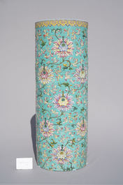 A large Chinese famille rose cylindrical vase with applied lotus scrolls, Jiaqing/Daoguang