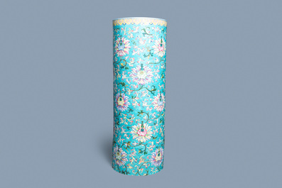 A large Chinese famille rose cylindrical vase with applied lotus scrolls, Jiaqing/Daoguang