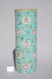 A large Chinese famille rose cylindrical vase with applied lotus scrolls, Jiaqing/Daoguang