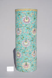 A large Chinese famille rose cylindrical vase with applied lotus scrolls, Jiaqing/Daoguang
