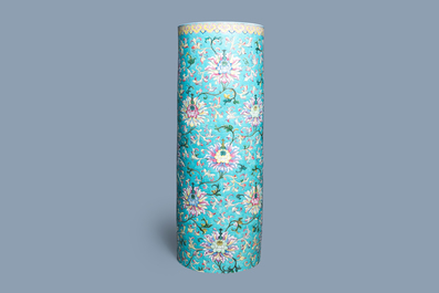 A large Chinese famille rose cylindrical vase with applied lotus scrolls, Jiaqing/Daoguang