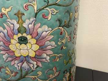 A large Chinese famille rose cylindrical vase with applied lotus scrolls, Jiaqing/Daoguang