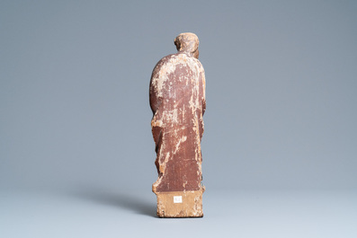 A polychromed oak figure of Saint Thomas on an armorial base, Normandy, France, ca. 1510