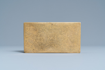 An engraved gilded copper travel inkwell with secret compartment, 17th C.