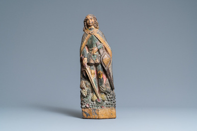 Een gepolychromeerde houten groep van Sint-Micha&euml;l die de draak bevecht, 16e eeuw