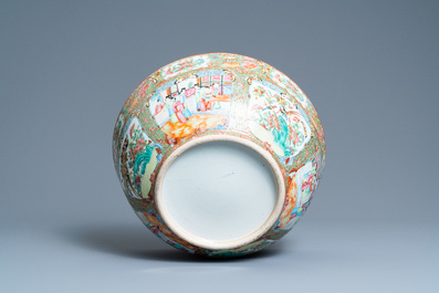 A large Chinese Canton famille rose bowl on wooden stand, 19th C.