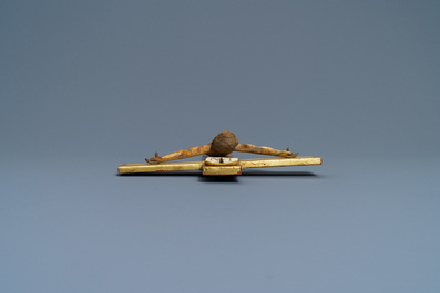An Indo-Portuguese ivory figure of Christ on a later crucifix, probably Goa, 17th C.