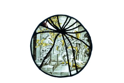 A pair of grisaille and silver yellow painted glass roundels with biblical scenes, France, 17th C.