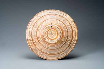 A Hispano-Moresque armorial lusterware dish, Manises, Spain, 15th C.
