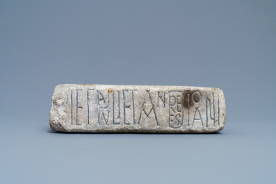 An inscribed Romanesque reliquary altar stone, France, 12th C.