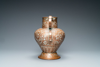 An Italian hammered copper Barberini armorial ewer, 17th C.