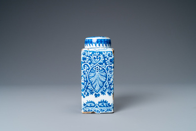 A Dutch Delft blue and white tea caddy with screw cap, late 17th C.