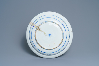 A large Dutch Delft cashmere palette charger, 1st half 18th C.