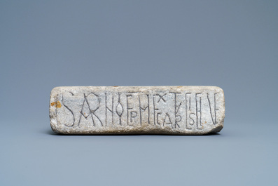 An inscribed Romanesque reliquary altar stone, France, 12th C.