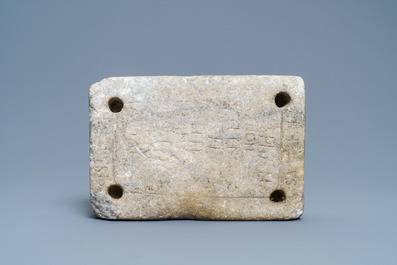 An inscribed Romanesque reliquary altar stone, France, 12th C.