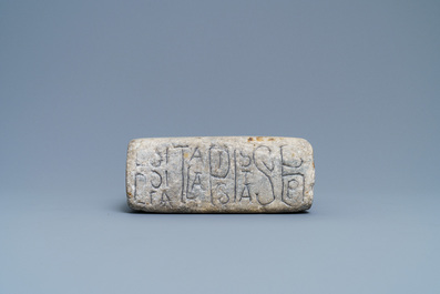 An inscribed Romanesque reliquary altar stone, France, 12th C.