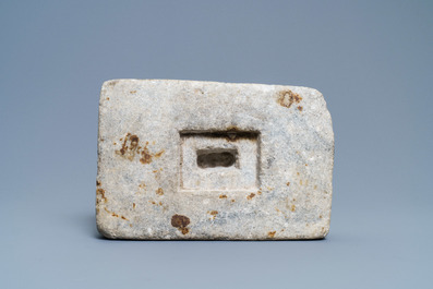 An inscribed Romanesque reliquary altar stone, France, 12th C.