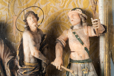 A polychromed and gilded alabaster 'flagellation' group in glass display, South-Italy, 17th C.