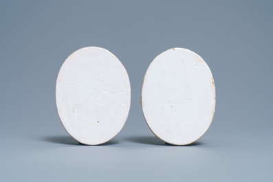 A pair of Dutch Delft style blue and white oval portrait plaques, Utrecht, ca. 1800