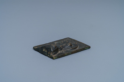 An Italian bronze plaque with a profile bust of Christ, probably Rome, early 16th C.