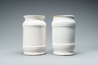 Two Dutch Delft blue and white albarello type drug jars, 18th C.