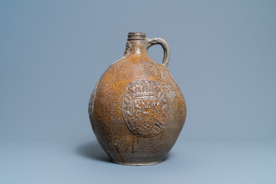 A large German stoneware bellarmine jug with three armorial medallions, Frechen, 1st half 17th C.