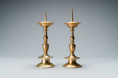 A pair of brass alloy candlesticks, Italy, 17th C.