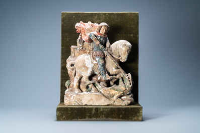 A polychromed stone group of Saint George slaying the dragon, probably Germany, 15th C.